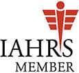 IAHRS MEMBER logo with red medical-style winged symbol.